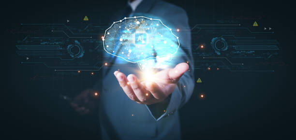 istock Data science of a human brain overlaid with digital data and network symbols indicating artificial intelligence, digital technology, Big data analysed with AI technology for business analytics. 2165062420
