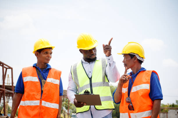 istock Group of contractors and engineer are discuss together at construction site. 2165070747