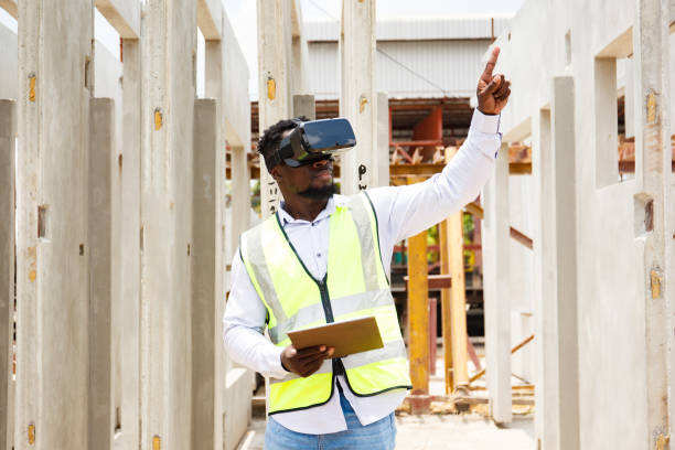 istock African black male civil engineer inspecting construction site using VR technology. 2165070768