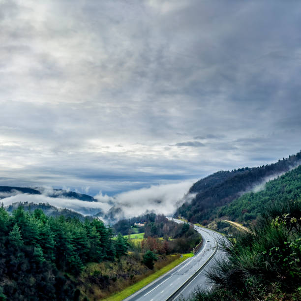 Dramatic landscape of smoky mountain range in Saint-Germain-Du-Teil, France
