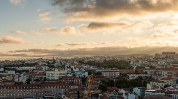 High angle view of the city of Lisbon, Portugal at dusk. Stitched panorama.