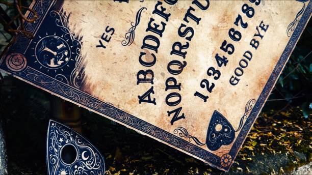 istock Witchcraft Spiritual Halloween Game Ouija Board 2165082085