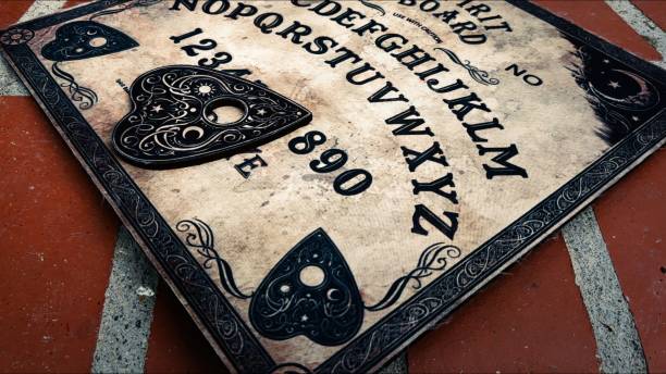 istock Witchcraft Spiritual Halloween Game Ouija Board 2165082151