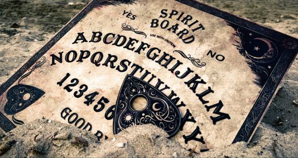 istock Witchcraft Spiritual Halloween Game Ouija Board 2165084108