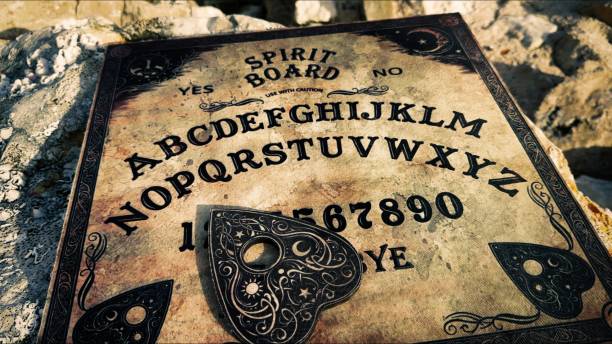istock Witchcraft Spiritual Halloween Game Ouija Board 2165084143