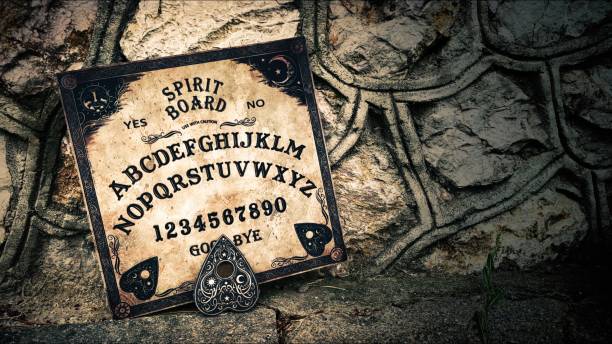 istock Witchcraft Spiritual Halloween Game Ouija Board 2165084635
