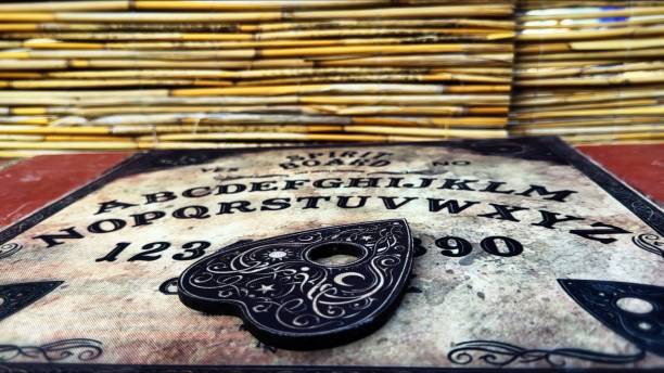 istock Witchcraft Spiritual Halloween Game Ouija Board 2165085651