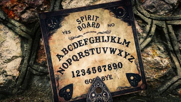 istock Witchcraft Spiritual Halloween Game Ouija Board 2165085691