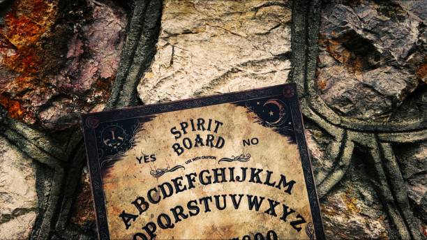 istock Witchcraft Spiritual Halloween Game Ouija Board 2165085734
