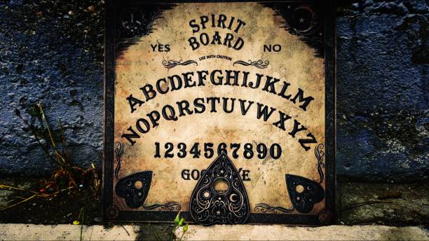 istock Witchcraft Spiritual Halloween Game Ouija Board 2165085778