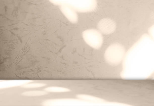 istock Autumn background brown studio room abstract shadow on wall floor blur cement, podium minimal cosmetic presentation, yellow orange cement empty backdrop platform stage table loft scene mockup podium. 2165086453