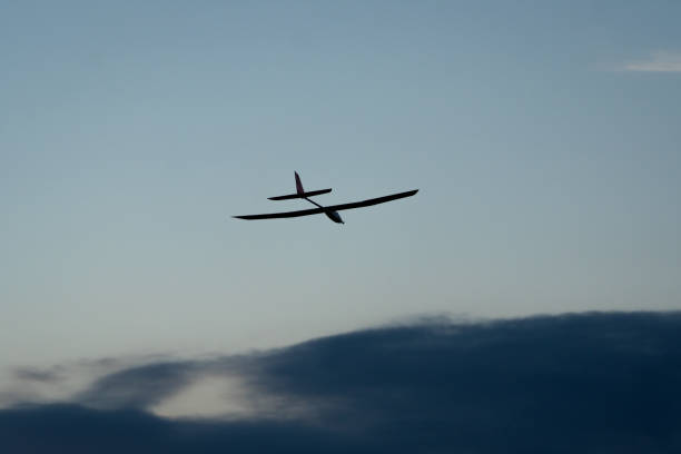 istock Silhouette of a model plane at twilight 2165088088