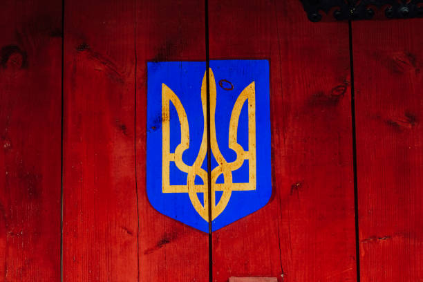 ukrainian trident symbol painted on a wooden wall