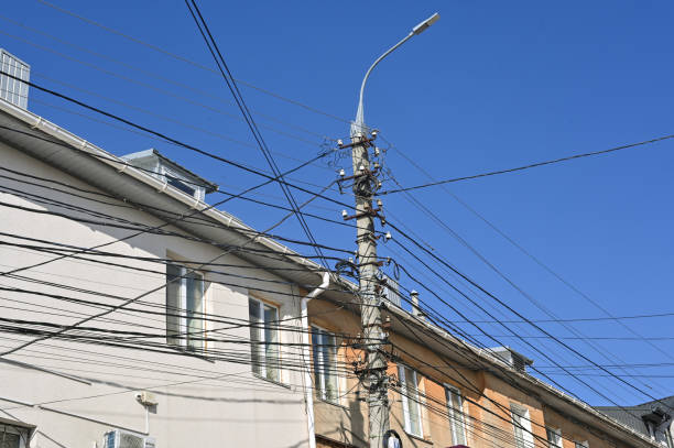 cables and wires on an electric pole. chaos