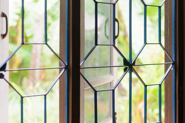 istock Soft Morning Sunlight Through a Vintage Window 2165103129