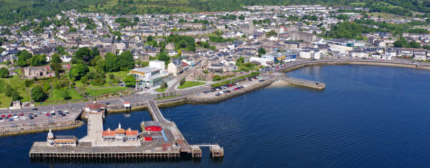 istock Dunoon victorian pier, derelict wooden structure and buildings 2165104107