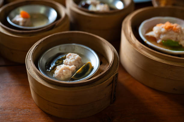 Steamed pork dumpling Siew Mai with century egg