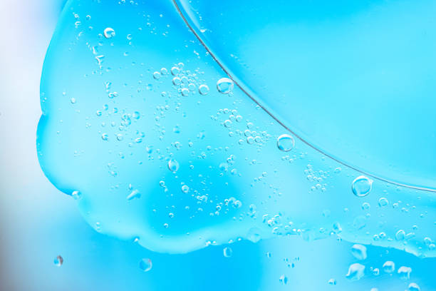 istock blue liquid with bubbles and droplets, creating an abstract, refreshing, and clean appearance. 2165116113