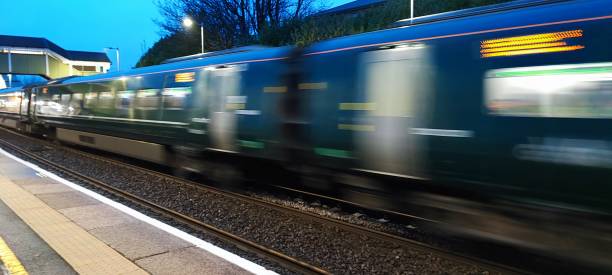 istock A train moving at speed through Bridgend train station. 2165121412