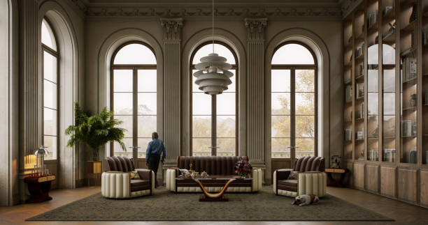 istock Elegant Living Room with Arched Windows Overlooking Autumn Foliage 2165128035