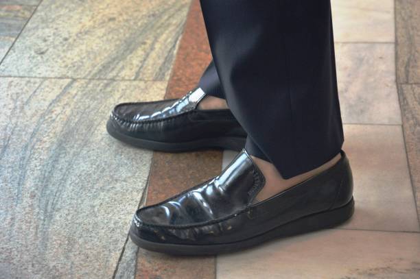 istock shoes on feet 2165129262