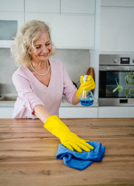 istock Senior woman cleaning her kitchen 2165131149