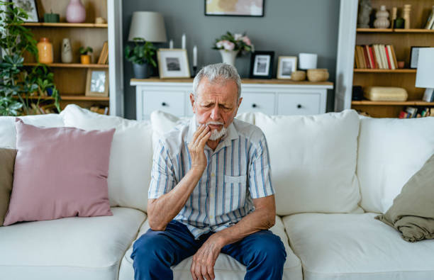 istock Senior man suffering from toothache 2165132059