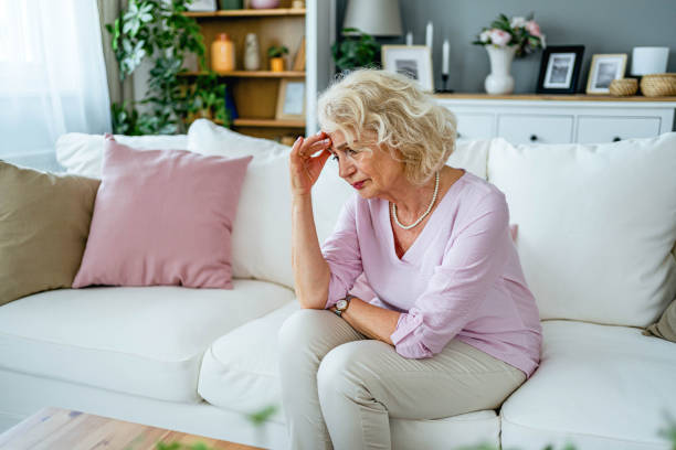 istock Senior woman suffering from headache 2165132105