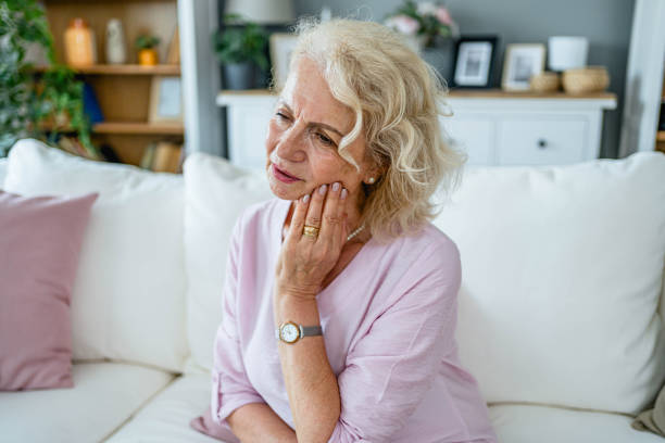 istock Senior woman suffering from toothache 2165132324