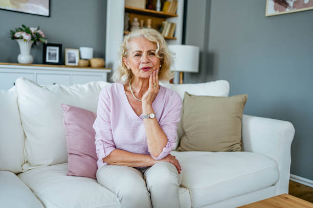 istock Senior woman suffering from toothache 2165132377