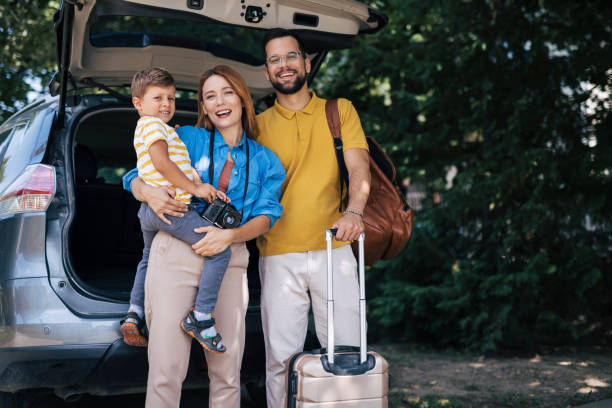 istock Parents with a child ready for car trip vacation 2165133096