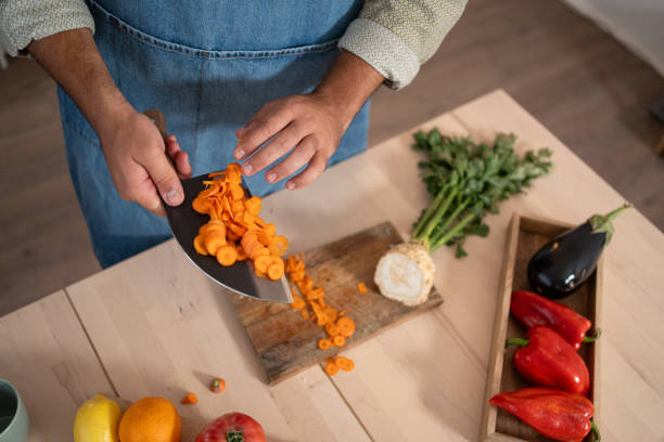 istock The chef prepares chopped vegetables 2165148956