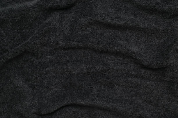 istock Soft Black Velvet Fabric Texture Close-Up for Elegant Backgrounds and Textiles 2165151473