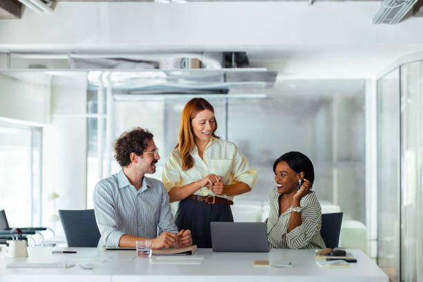 Colleagues Collaborating in a Meeting in Modern Office Space