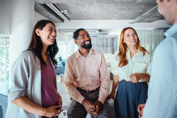 istock Diverse Business Team Having a Positive Discussion in Modern Office 2165154367