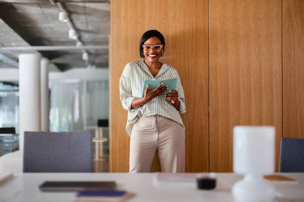 istock Confident Businesswoman Working On Digital Tablet In Modern Office 2165154399