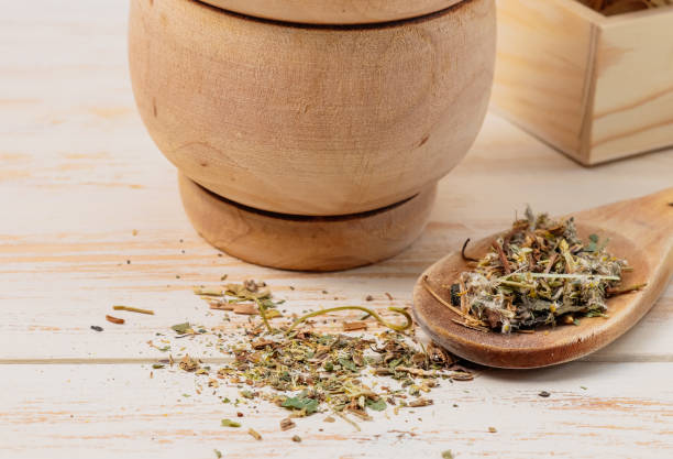 istock Dried flowers in a spoon on the table. 2165155921