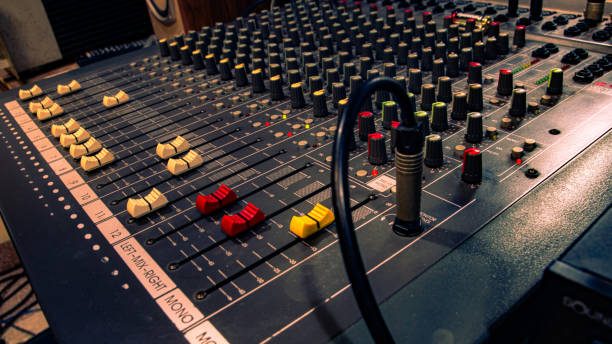 istock Professional audio mixing console with many buttons and slides. 2165159593