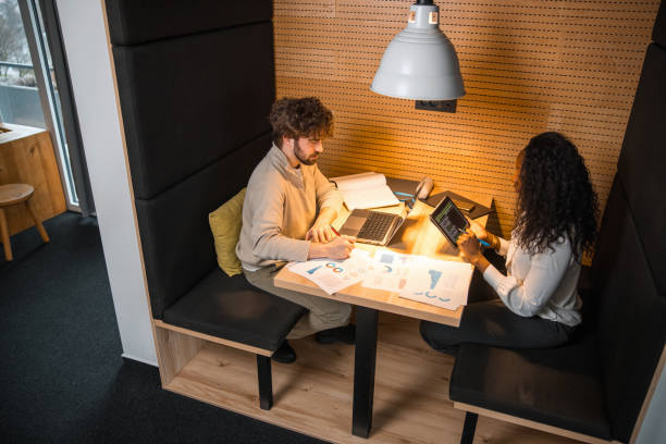 istock Diverse Investors Evaluating Market Trends 2165161419
