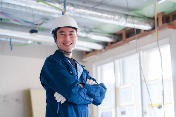 istock Male craftsman crossing his arms at a construction site 2165168238