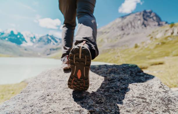 istock Men's walk in the mountains 2165170565