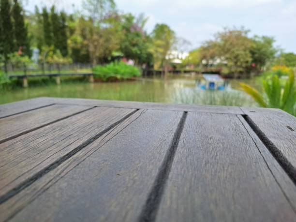 istock The wooden table has a blurry view. 2165172180