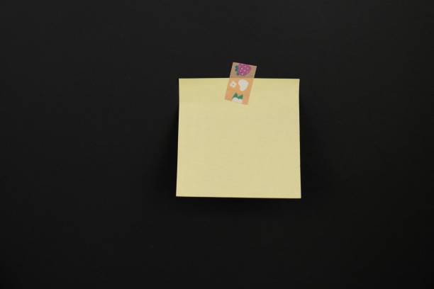 istock paper note reminder sticky notes pin paper on cork bulletin board. empty space for text. 2165178076