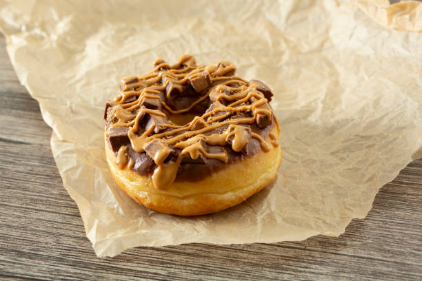 istock peanut butter chocolate donut 2165183012