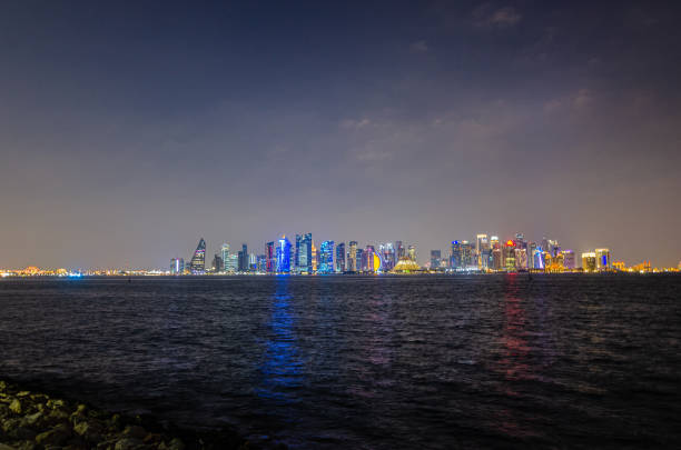 istock Doha corniche and business district night view 2165186296