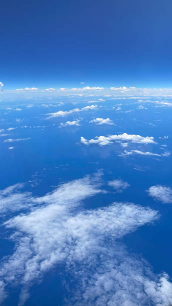 istock VERTICAL VIDEO, Aerial view from airplane window above cloud. 2165195132