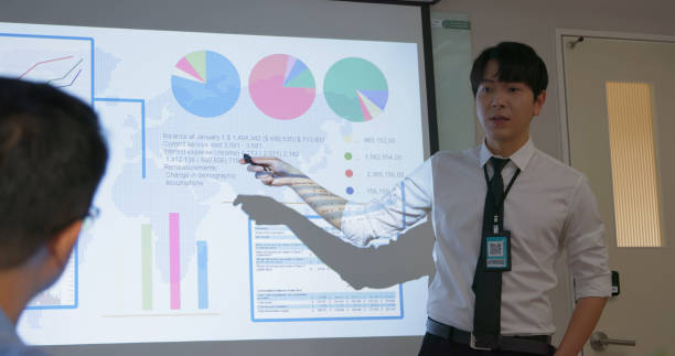 istock businessman do presentation in boardroom 2165196367