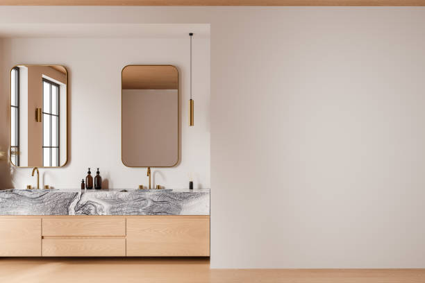 istock Beige home bathroom interior with sink and accessories, mockup wall 2165201182