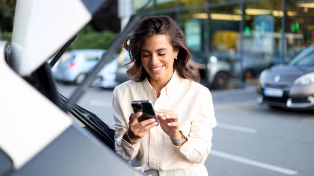 istock Woman using smartphone after shopping 2165202151
