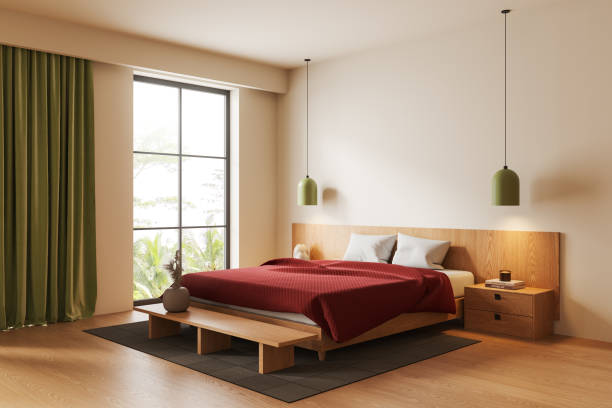 istock Beige home bedroom interior with bed and bench with decor, panoramic window 2165202336